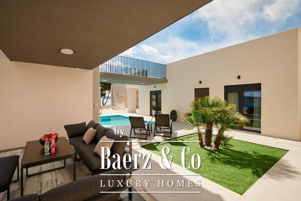 photo 1 Omiš, Dugi Rat, modern villa with a beautiful view of the sea